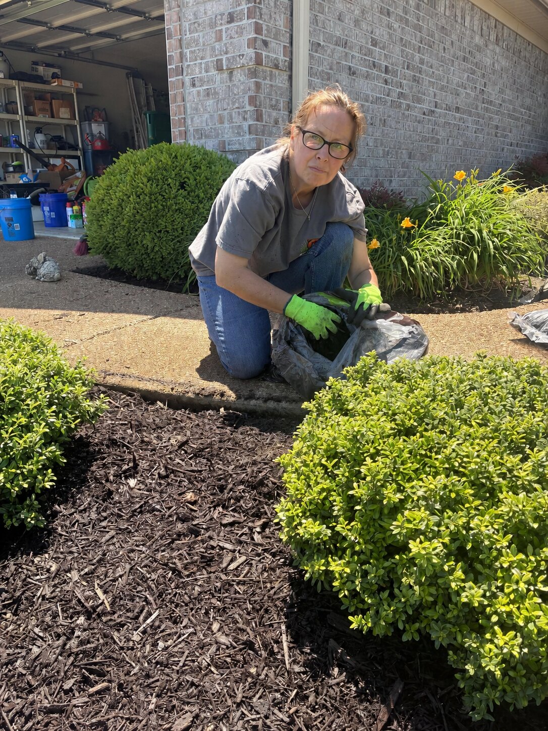 Grizzly Lawn Co. refreshing a flower bed